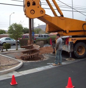 Pole sign hole being drilled by big drill rig