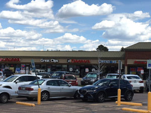 Storefront signs in shopping center